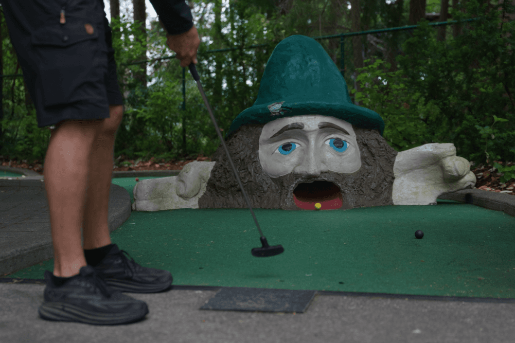 Player putting beside a stump character with a shocked face